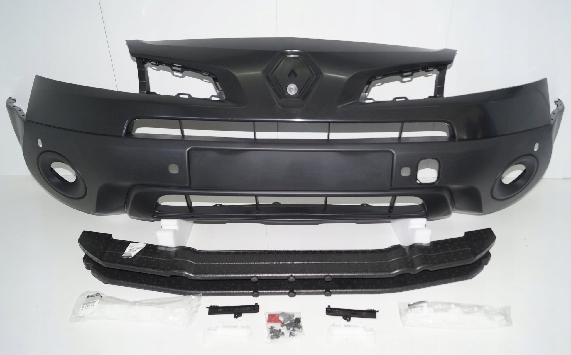 KOLEOS I 1 07-11 FACTORY NEW FRONT BUMPER 4 PDC ORIGINAL